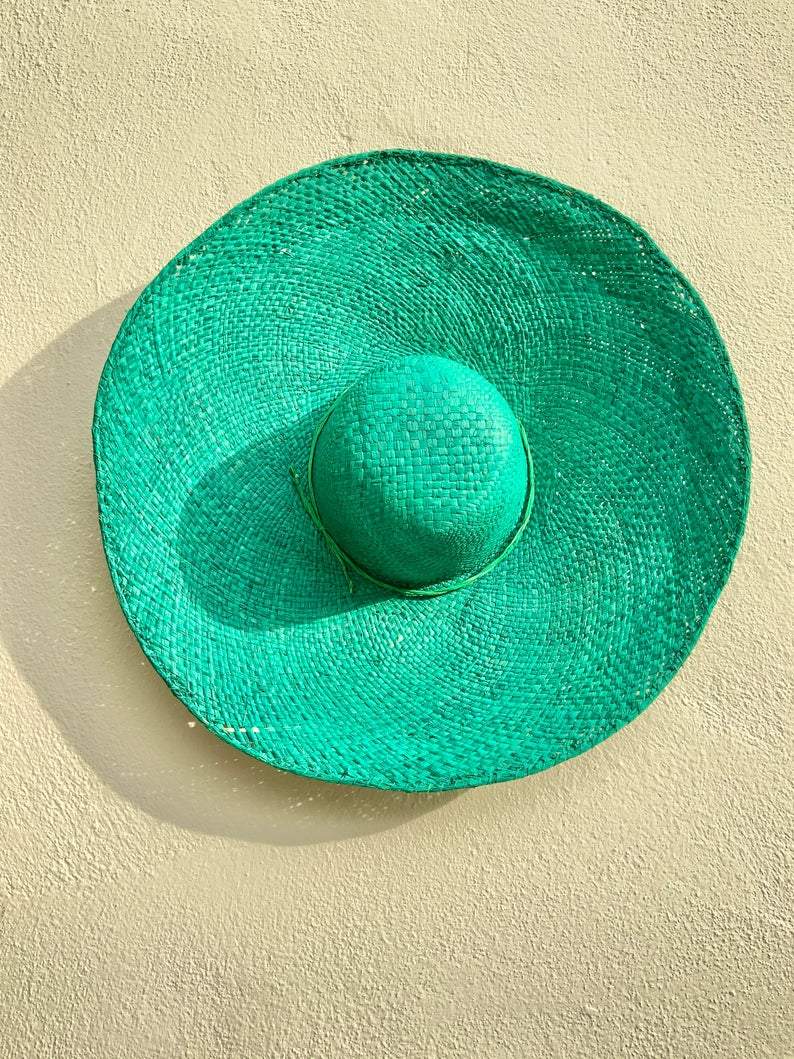 Bright green raffia straw hat