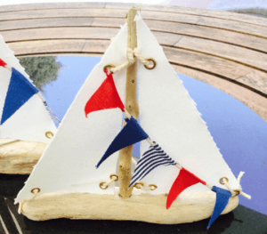 Driftwood Sailboat with flag bunting