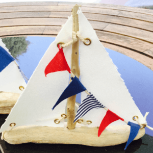 Driftwood Sailboat with Flag Bunting